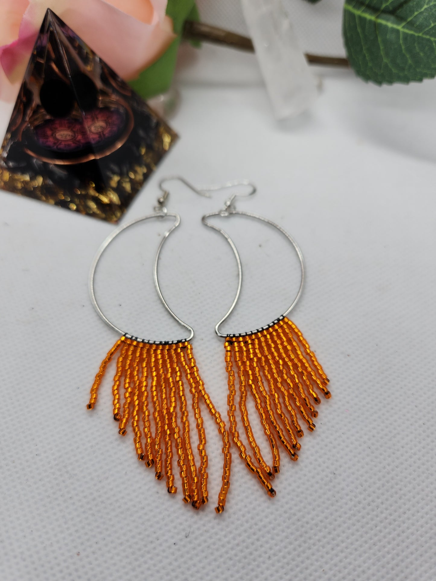 Orange fringe moon earrings