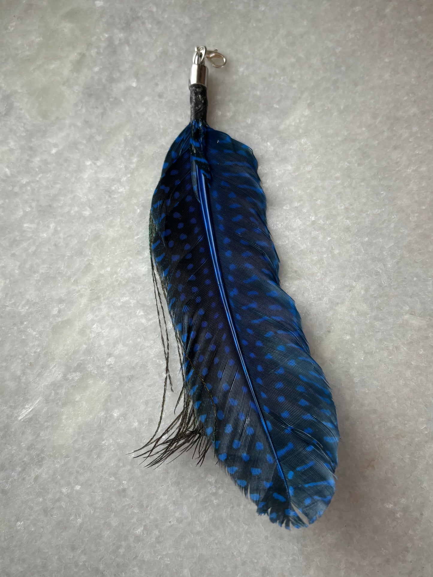 Peacock feather charm