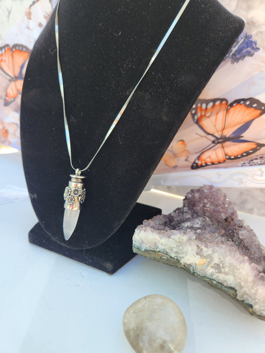 Crystal clear flower dagger pendant